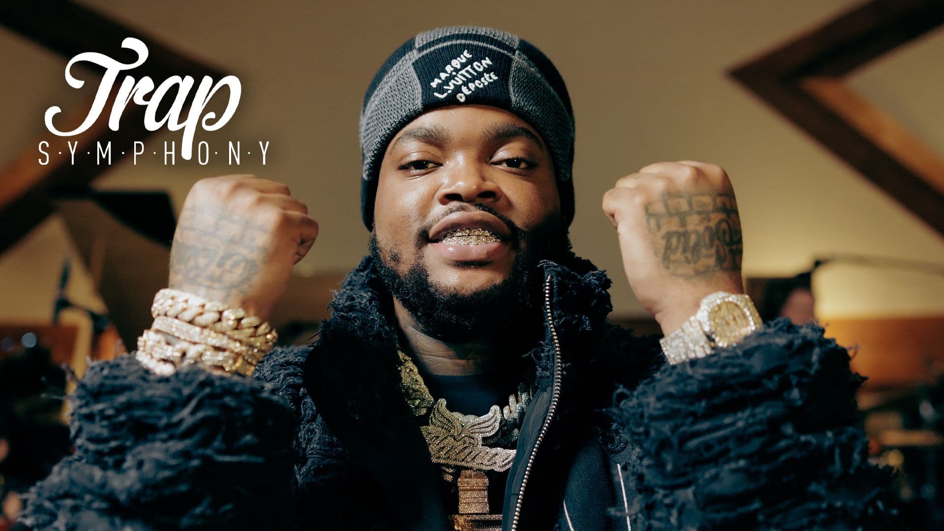Watch BossMan Dlow Perform “Mr Pot Scraper,” "Get In With Me" & More With a Live Orchestra for Trap Symphony